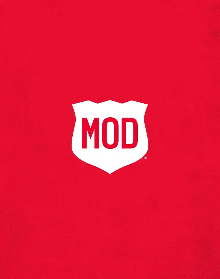 MOD Pizza creative campaign concept by Anchour, a national branding agency. Clean, bold red design emphasizing fast-casual restaurant branding and modern franchise identity systems.